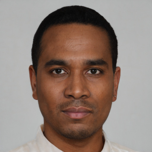 Neutral black young-adult male with short  black hair and brown eyes