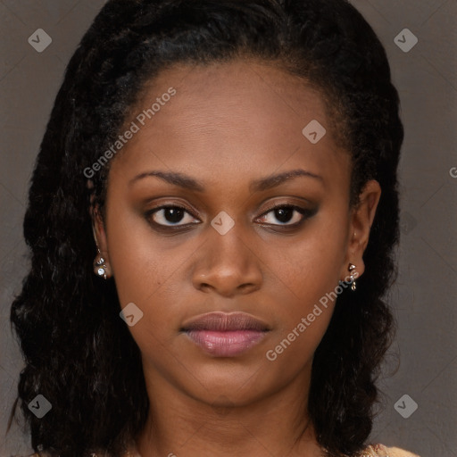 Neutral black young-adult female with long  brown hair and brown eyes