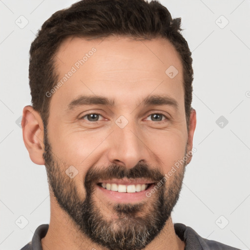 Joyful white young-adult male with short  black hair and brown eyes