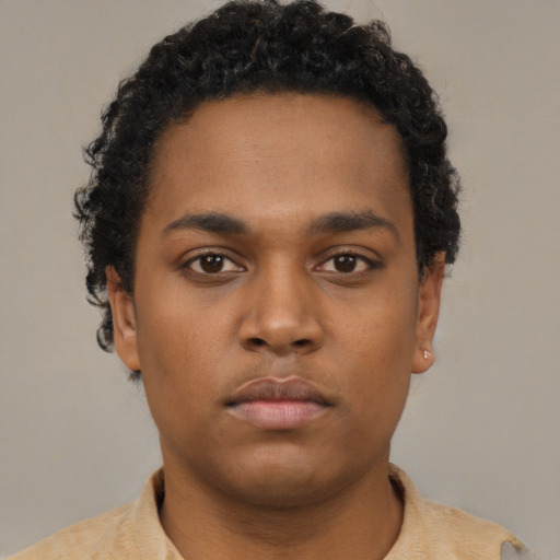 Neutral black young-adult male with short  brown hair and brown eyes