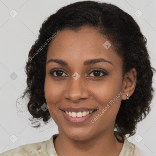 Joyful black young-adult female with medium  brown hair and brown eyes