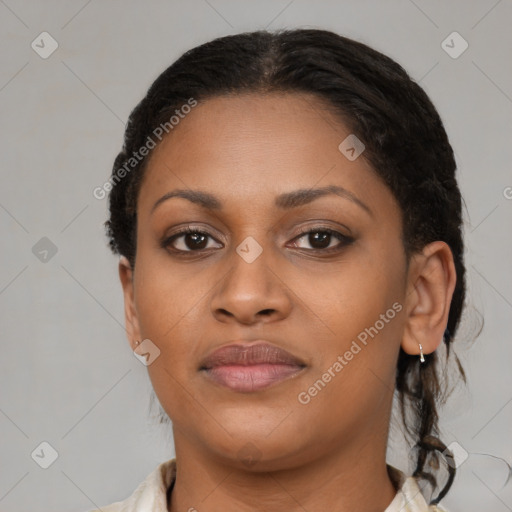 Joyful black young-adult female with medium  brown hair and brown eyes