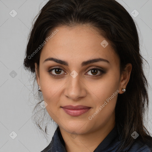 Joyful latino young-adult female with long  brown hair and brown eyes