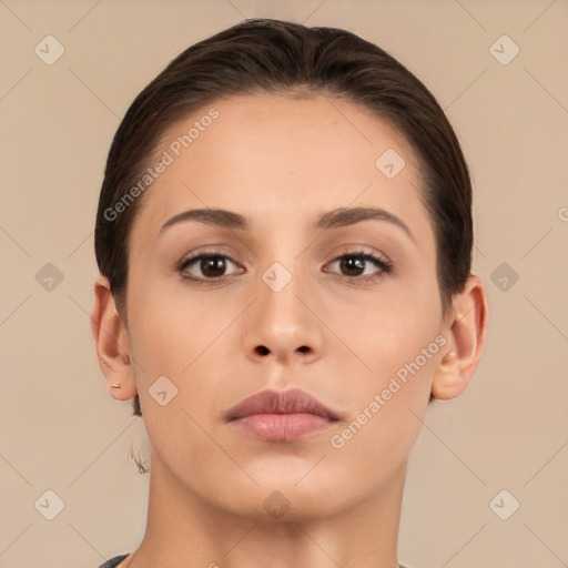 Neutral white young-adult female with medium  brown hair and brown eyes