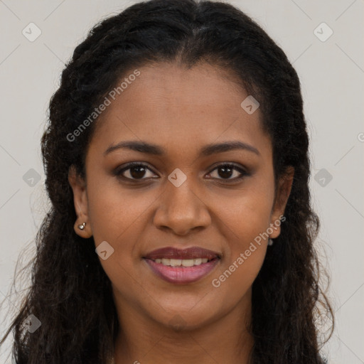 Joyful black young-adult female with long  brown hair and brown eyes