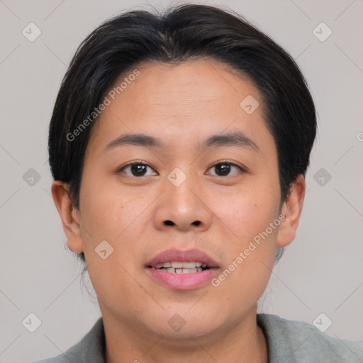 Joyful asian young-adult male with short  brown hair and brown eyes