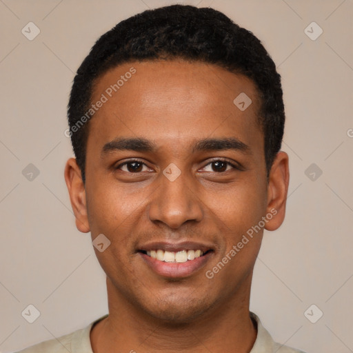 Joyful black young-adult male with short  black hair and brown eyes