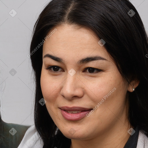 Joyful white adult female with medium  brown hair and brown eyes