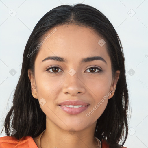 Joyful latino young-adult female with long  brown hair and brown eyes