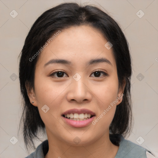 Joyful asian young-adult female with medium  black hair and brown eyes