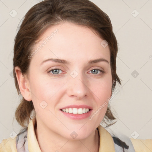 Joyful white young-adult female with medium  brown hair and blue eyes