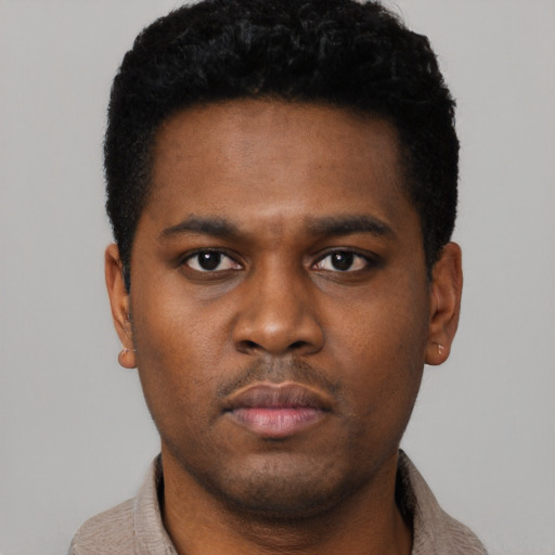 Neutral black young-adult male with short  black hair and brown eyes