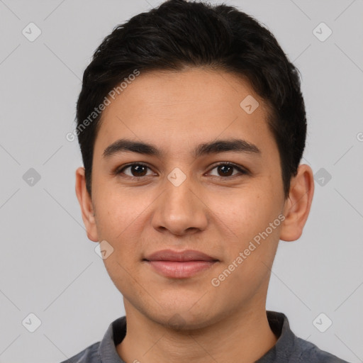 Joyful white young-adult male with short  black hair and brown eyes