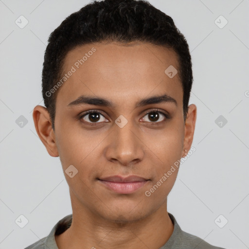 Joyful latino young-adult male with short  brown hair and brown eyes