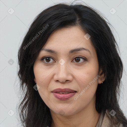 Joyful asian young-adult female with long  brown hair and brown eyes