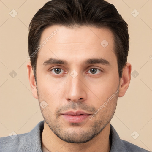 Neutral white young-adult male with short  brown hair and brown eyes