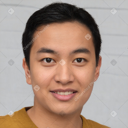 Joyful asian young-adult male with short  brown hair and brown eyes