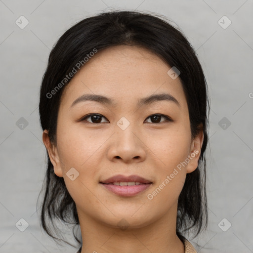 Joyful asian young-adult female with medium  black hair and brown eyes