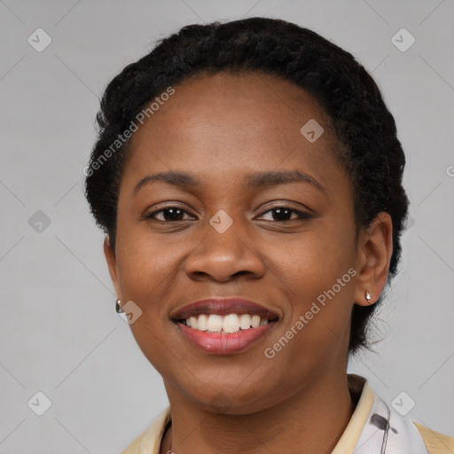 Joyful latino young-adult female with short  black hair and brown eyes