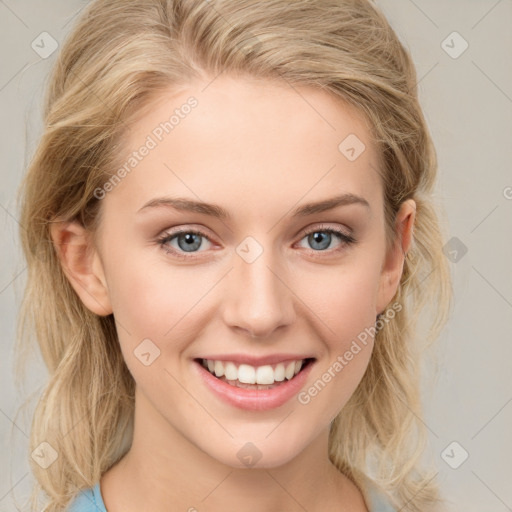 Joyful white young-adult female with medium  brown hair and blue eyes