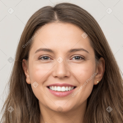 Joyful white young-adult female with long  brown hair and grey eyes