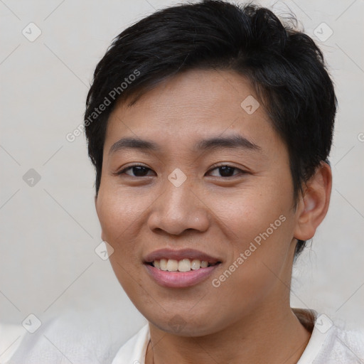 Joyful asian young-adult female with short  brown hair and brown eyes