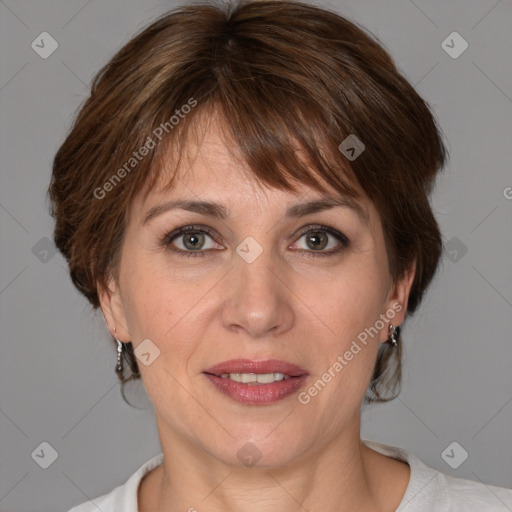 Joyful white adult female with medium  brown hair and grey eyes