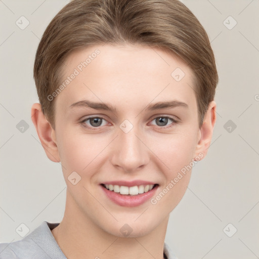 Joyful white young-adult female with short  brown hair and grey eyes