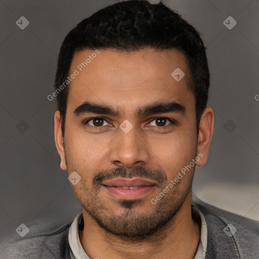 Joyful latino young-adult male with short  black hair and brown eyes