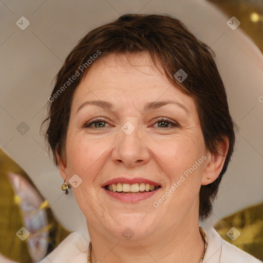 Joyful white adult female with medium  brown hair and brown eyes