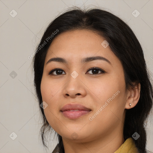 Joyful asian young-adult female with medium  black hair and brown eyes