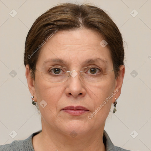 Joyful white adult female with short  brown hair and grey eyes