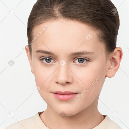 Joyful white child female with short  brown hair and brown eyes