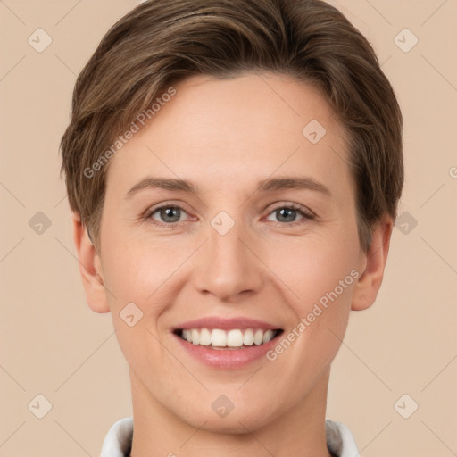 Joyful white young-adult female with short  brown hair and grey eyes