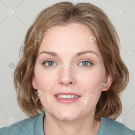 Joyful white young-adult female with medium  brown hair and blue eyes