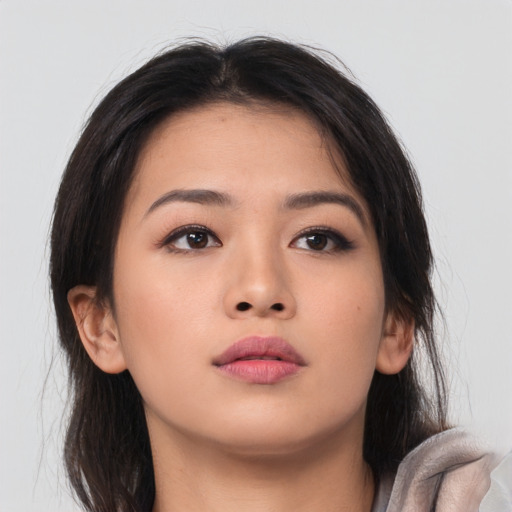 Neutral asian young-adult female with long  brown hair and brown eyes