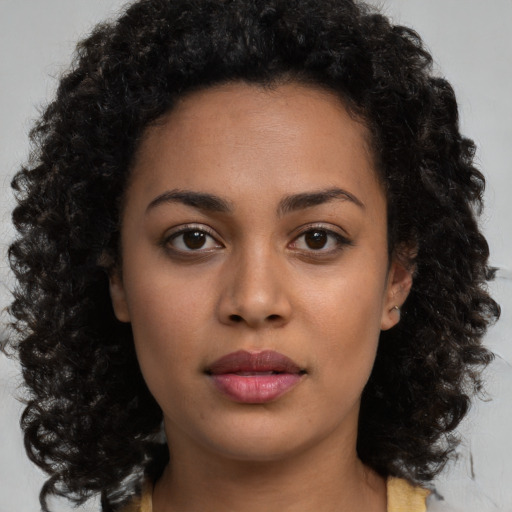 Neutral latino young-adult female with medium  brown hair and brown eyes