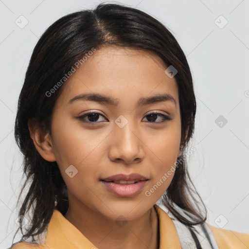 Joyful latino young-adult female with medium  brown hair and brown eyes