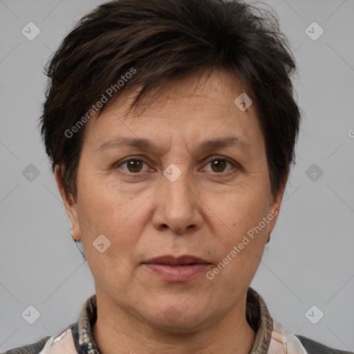 Joyful white adult female with short  brown hair and brown eyes