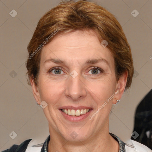 Joyful white adult female with short  brown hair and grey eyes