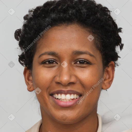 Joyful black young-adult female with short  brown hair and brown eyes