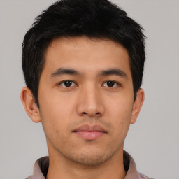 Neutral asian young-adult male with short  black hair and brown eyes