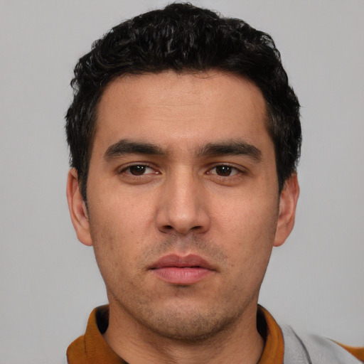 Neutral white young-adult male with short  black hair and brown eyes