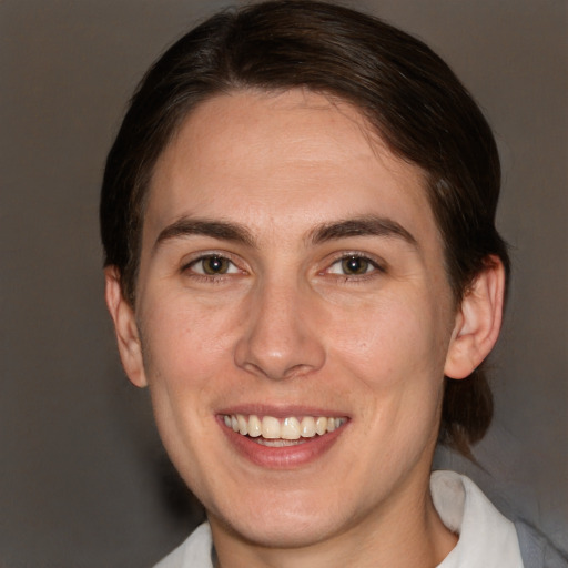 Joyful white young-adult female with medium  brown hair and brown eyes