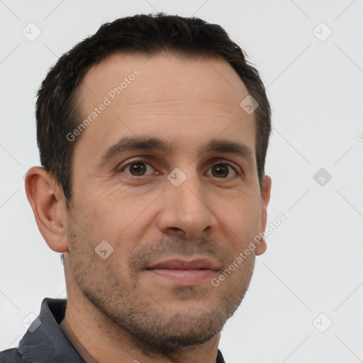 Joyful white adult male with short  brown hair and brown eyes