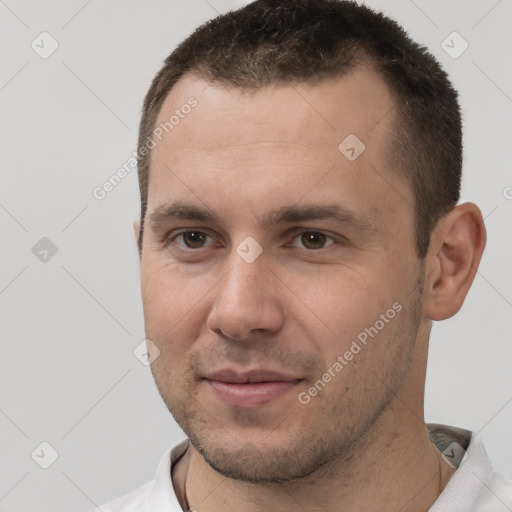 Joyful white young-adult male with short  brown hair and brown eyes