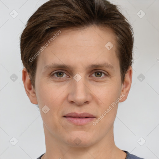 Joyful white adult male with short  brown hair and grey eyes