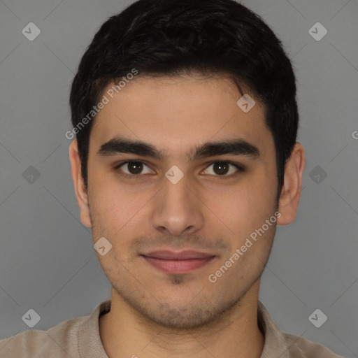 Joyful latino young-adult male with short  brown hair and brown eyes