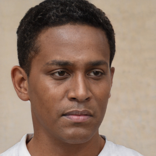 Neutral latino young-adult male with short  brown hair and brown eyes