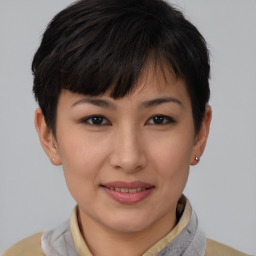 Joyful asian young-adult female with short  brown hair and brown eyes